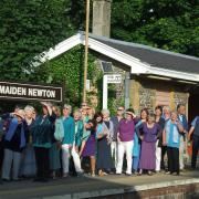 Maiden Newton platform publicity photo for the The Quangle Wangle Choir