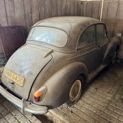 Morris Minor in a stable