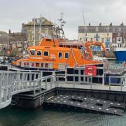 The regular lifeboat in Weymouth harbour is currently under going maintenance work in Poole