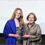 Penelope and her daughter Phyllida receiving the award at the English Wedding Awards