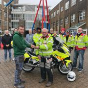Dorchester Round Table Chairman William Grassby (Left) and Chairman of YFW Bloodbikes Andrew Wiley (Right) with members of the YFW group, round table and Chief Nurse Jo Howarth
