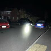 Two cars parked diagonally opposite one another on a bend slowed down a fire engine on a callout