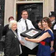 South Dorset MP Richard Drax, Portland councillor Sandy West, borough councillor Kate Wheller,  Echo reporter Catherine Bolado, Stella Roper and Mark Bowditch of the MV Freedom  take the coastguard petition to Number 10