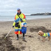 Brian Hallworth litter picking on Weymouth Beach