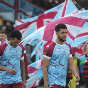 Jordon Thompson, right, has committed for a second season with Weymouth