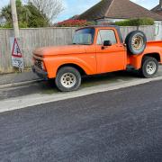 The ford pickup could not be moved and the road was resurfaced around it