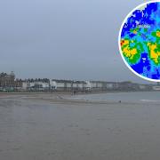 Rain has lashed onto Weymouth Beach