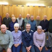 Project team leader Jim Sinclair who is sitting centre front row with the club's Lady Captain Jane Renton on his right with the other volunteers
