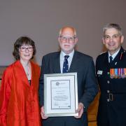 Cllr Pete Barrow (centre) receiving his 'Making a Difference' award from Chief Fire Officer Ben Ansell