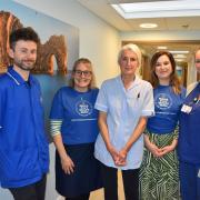 Photo of Weldmar team members launching Making Every Moment Matter: James (Staff Nurse), Clare (Fundraiser), Suzie (Health Care Assistant), Gloria (Fundraising Lead), Diana (Advanced Nurse Practitioner), pictured at Weldmar's Inpatient Unit in