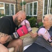 Jean, 105, tries Muay Thai boxing with Lee from Valhalla Martial Arts