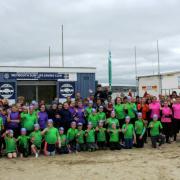 Weymouth SLSC members at the clubhouse on Weymouth Beach