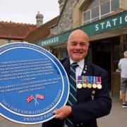 Swanage Railway Trust chairman Frank Roberts with D-Day 80 plaque Swanage station