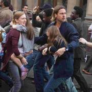 BRAAAINS: Brad Pitt uses brain power to fight a pandemic in World War Z.