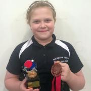 Portesham Primary School pupil, Jess Moggeridge (11), takes part in the Table Tennis National Championships (under 10 to 13 year olds)