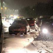 Hundreds of drivers abandoned their cars on the Dorset Way in Poole after heavy snowfall brought gridlock to Dorset's roads..