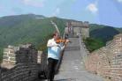 MY OLD CHINA: Violinist David Juritz busking on the Great Wall of China
