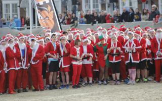 A previous Chase the Pudding Santa run held on Weymouth beach