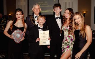 WOW members, Hollie Hope, Oliver Cecil, Ben Cecil, Mersey Moore and Erin Purnell, received the award from Nick Lawrence, the President of NODA