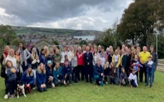 The Ukrainian group at Cumulus Outdoors Swanage pictured with Mayor of Swanage Tina Foster and Consort Chris Moreton, together with Cumulus staff and Radipole Church volunteers