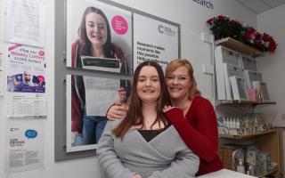 Aleesha-Marie Southam, 17, who beat leukaemia, pictured at the Weymouth Cancer Research UK shop with her mum, Emma