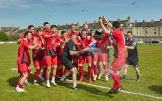 Sturminster Newton celebrate winning the DPL Cup with a 2-1 victory over Wimborne Town Reserves