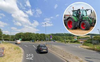 A broken down tractor causes delays at the roundabout between the A35 and the A31 at Bere Regis