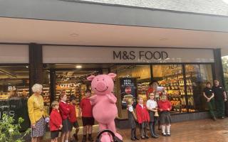 St Johns children with Percy Pig and the town crier