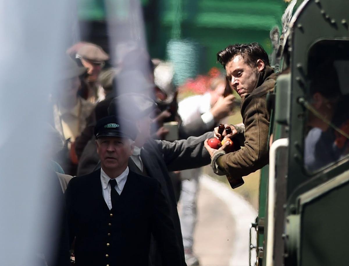 Harry Styles filming Dunkirk at Swanage Railway station. Pictures: Finnbarr Webster