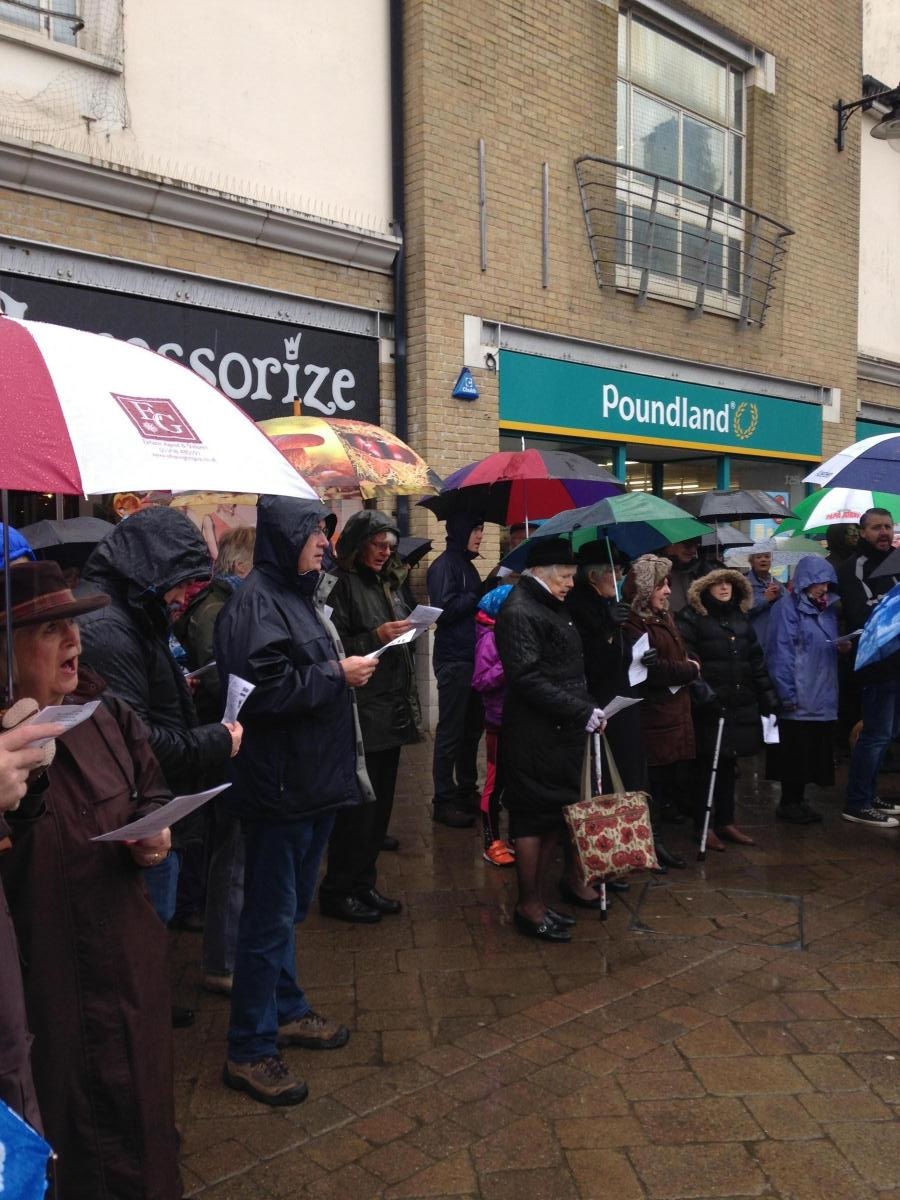 Crosses in the rain: Good Friday march brings together Weymouth ...